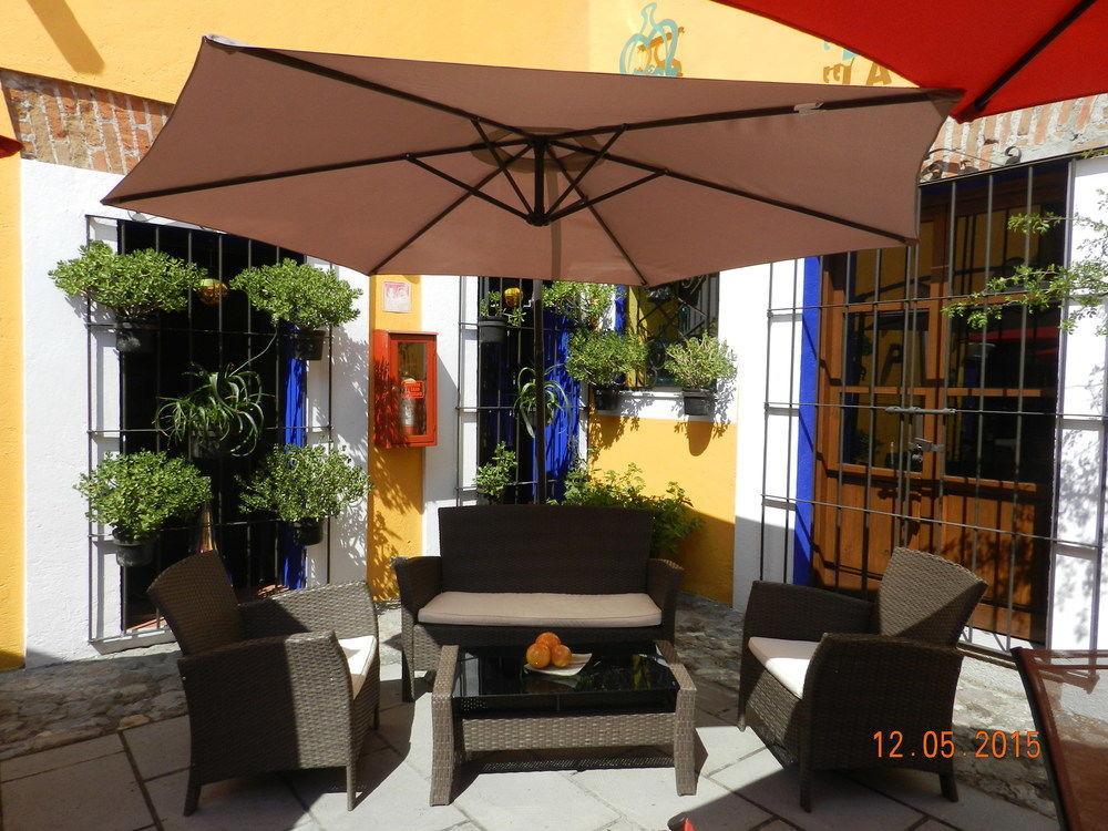 Hotel Collection O Al Otro Lado Del Rio, Puebla Exterior foto A patio in Mexico City