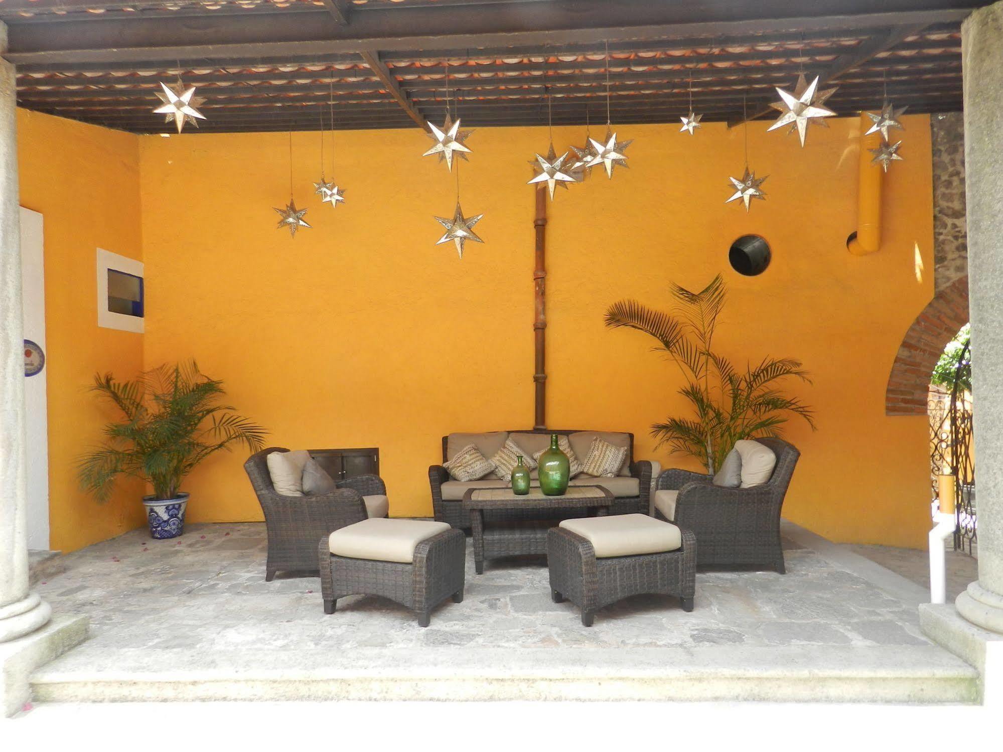 Hotel Collection O Al Otro Lado Del Rio, Puebla Exterior foto Interior of a typical house in San Cristóbal de Las Casas