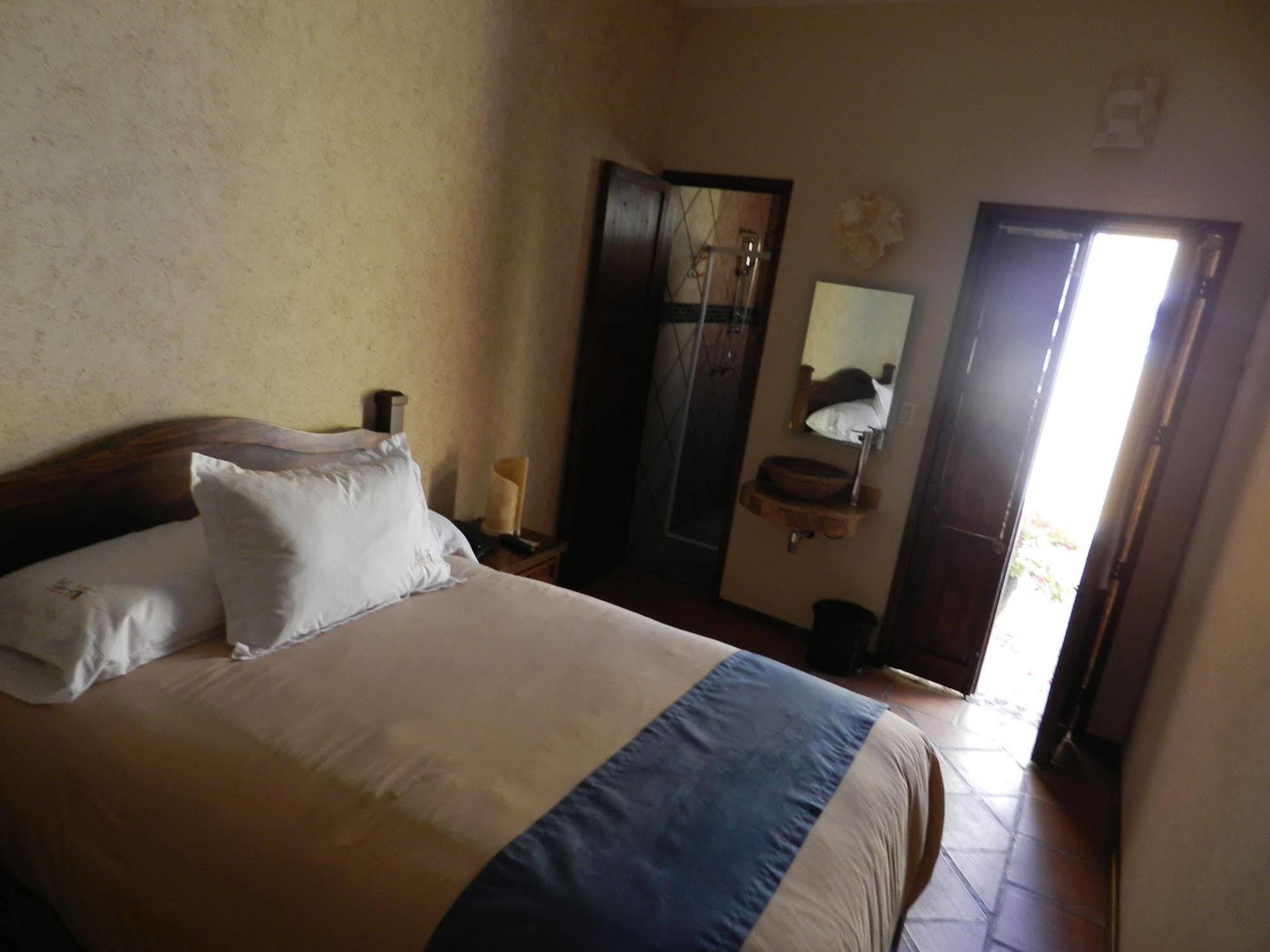 Hotel Collection O Al Otro Lado Del Rio, Puebla Exterior foto A room at the hotel