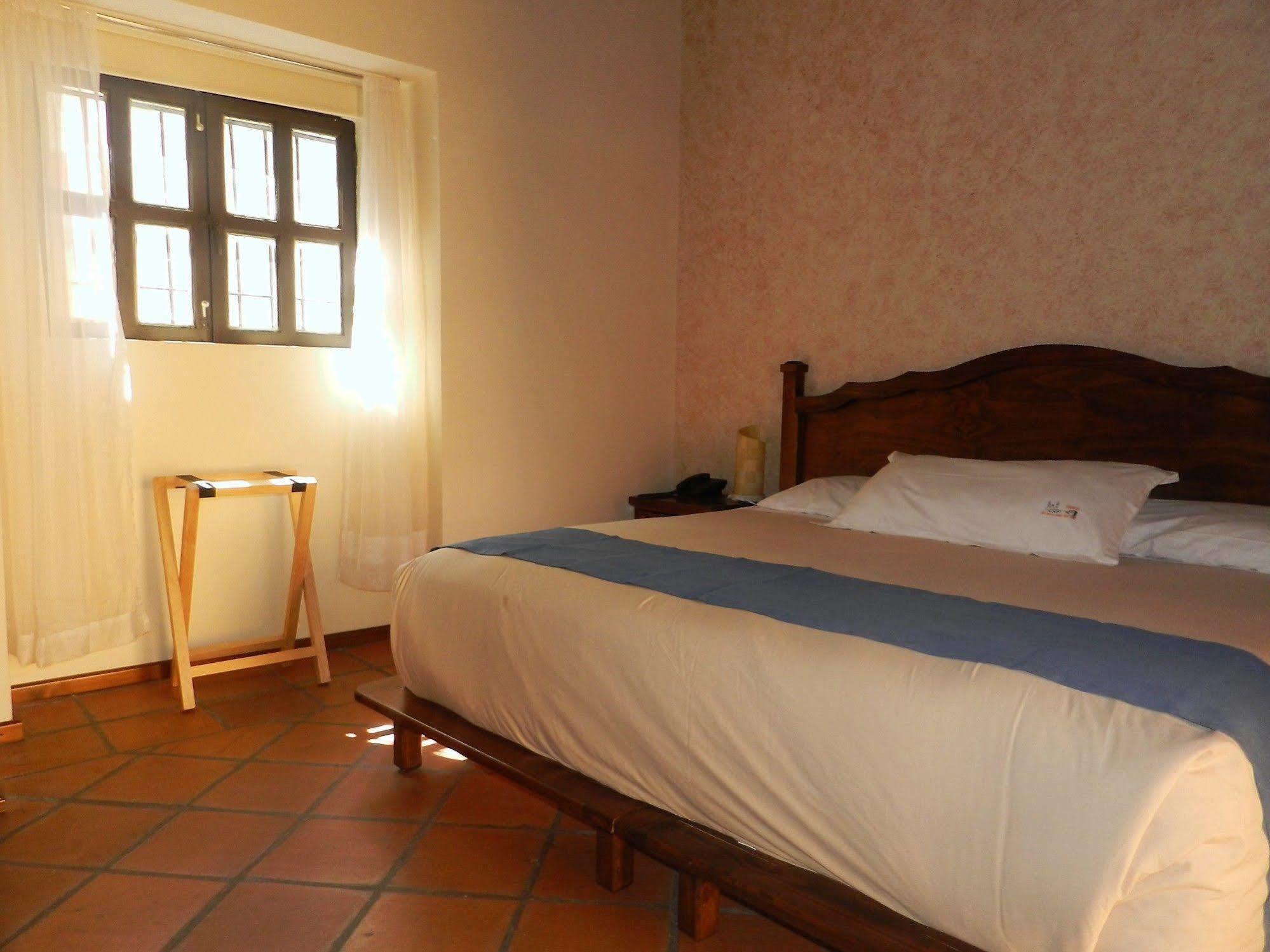 Hotel Collection O Al Otro Lado Del Rio, Puebla Exterior foto A room at Hotel San Cristóbal
